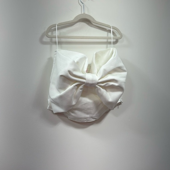 Pink Lily Tops - Strapless bow top size large has boning